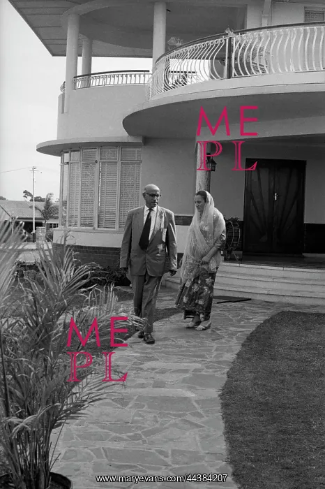 : October 14 1962 - Mr. and Mrs. Moolla in their garden : October 14 1962 - Mr. and Mrs. Moolla in their garden