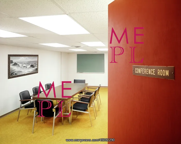: Office Space Door Ajar with View into Empty Conference Room : Office Space Door Ajar with View into Empty Conference Room