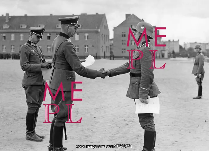 : Officers give awards for longtime service in Berlin, 193 : Officers give awards for longtime service in Berlin, 193