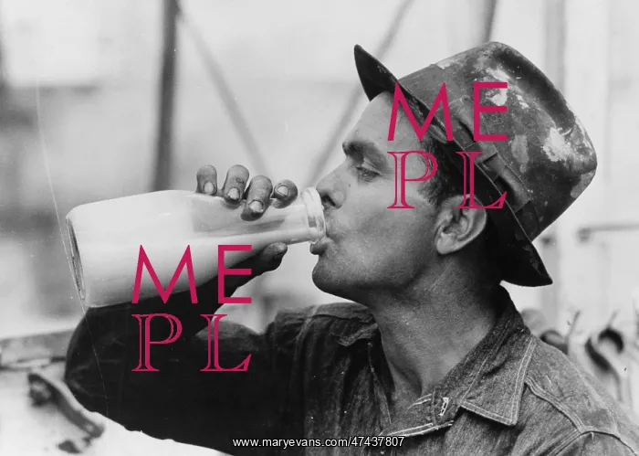 : Oil field worker drinking a bottle of milk at lunch, Kilgore : Oil field worker drinking a bottle of milk at lunch, Kilgore