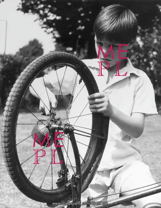 : OILING A BICYCLE WHEEL : OILING A BICYCLE WHEEL