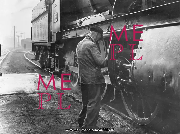 : OILING A LOCOMOTIVE : OILING A LOCOMOTIVE