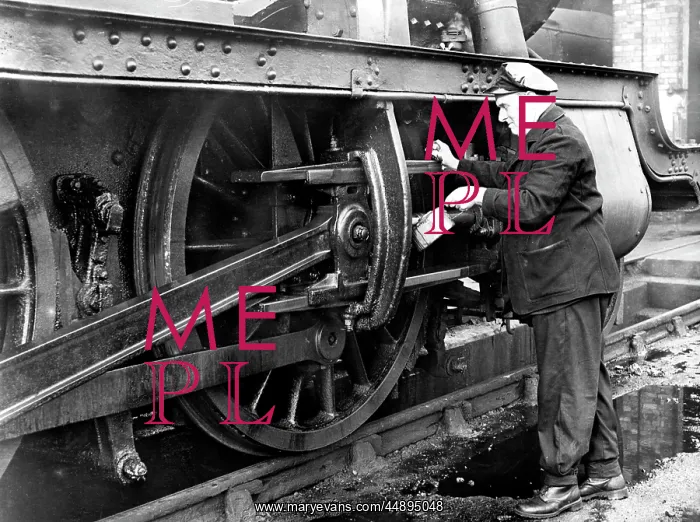 : Oiling up a locomotive : Oiling up a locomotive