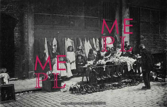 : Old clothes stall, East End of London : Old clothes stall, East End of London