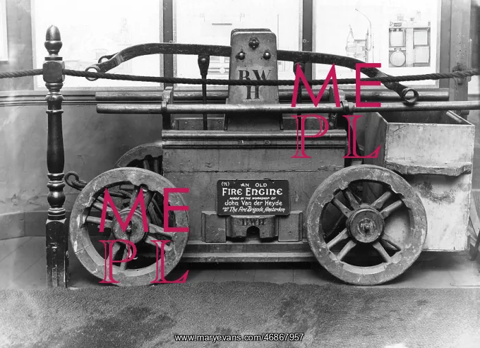 : Old Dutch fire engine in a museum : Old Dutch fire engine in a museum
