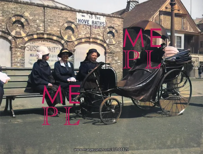 : Old lady in a bath chair : Old lady in a bath chair