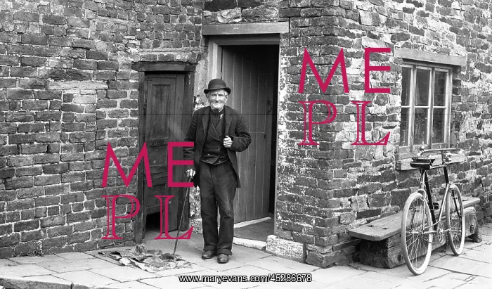 : Old man outside house : Old man outside house