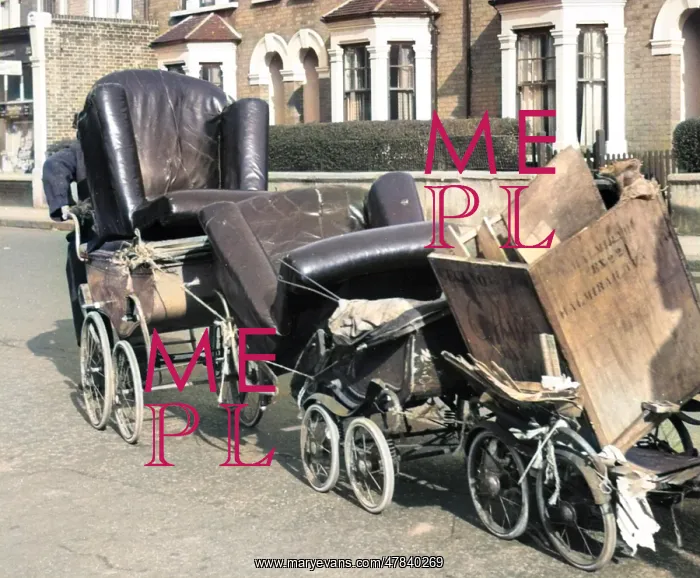 : Old man pulling prams, Balham, SW London : Old man pulling prams, Balham, SW London
