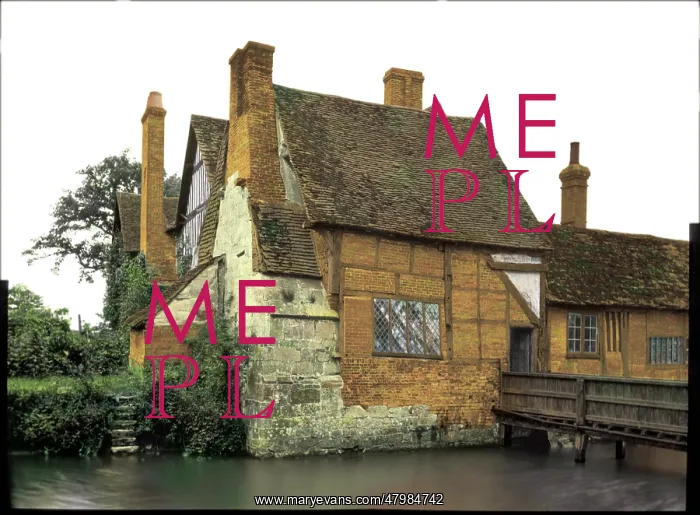 : Old timbered house by a river : Old timbered house by a river