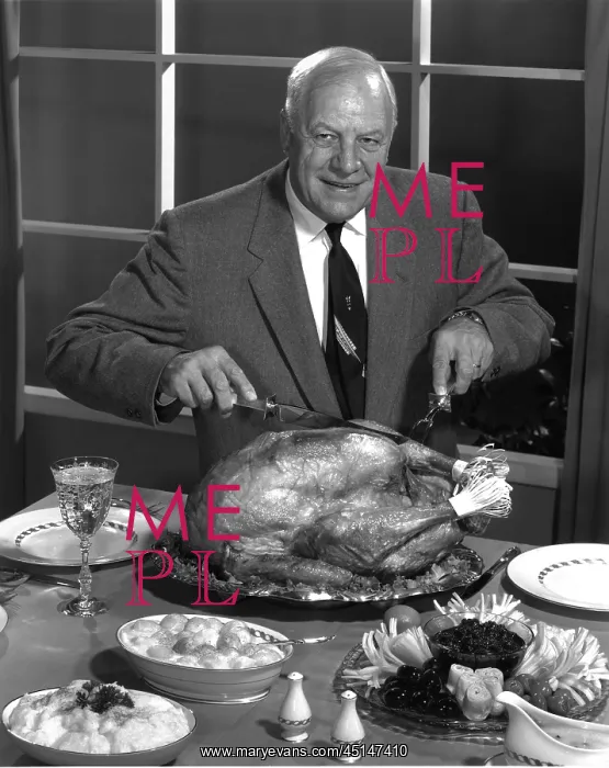 : Older Man Carving a Turkey : Older Man Carving a Turkey
