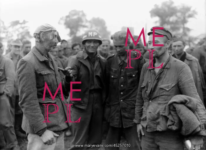 : Two older POWs fighting in the German army were : Two older POWs fighting in the German army were