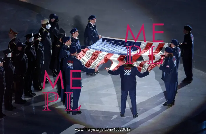 : The US Olympic Team holds the American flag that : The US Olympic Team holds the American flag that
