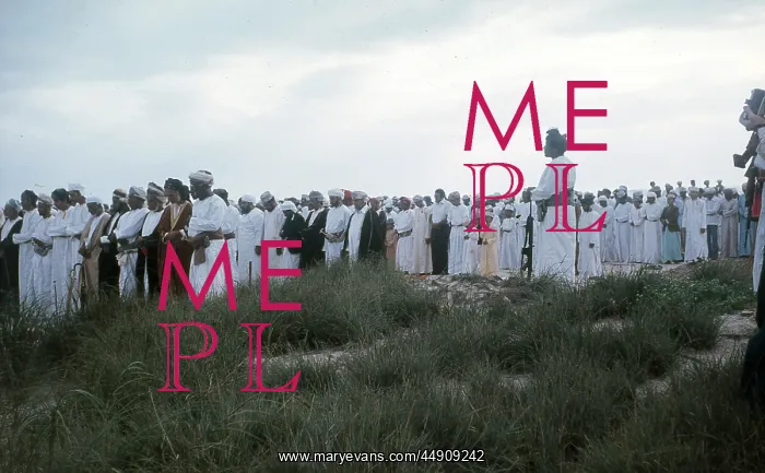: Omani elders stand with heads bowed in Oman : Omani elders stand with heads bowed in Oman
