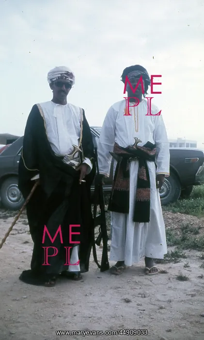 : Two Omani elders in traditional dress : Two Omani elders in traditional dress