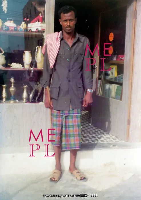 : Omani man standing in front of a shop in Oman : Omani man standing in front of a shop in Oman