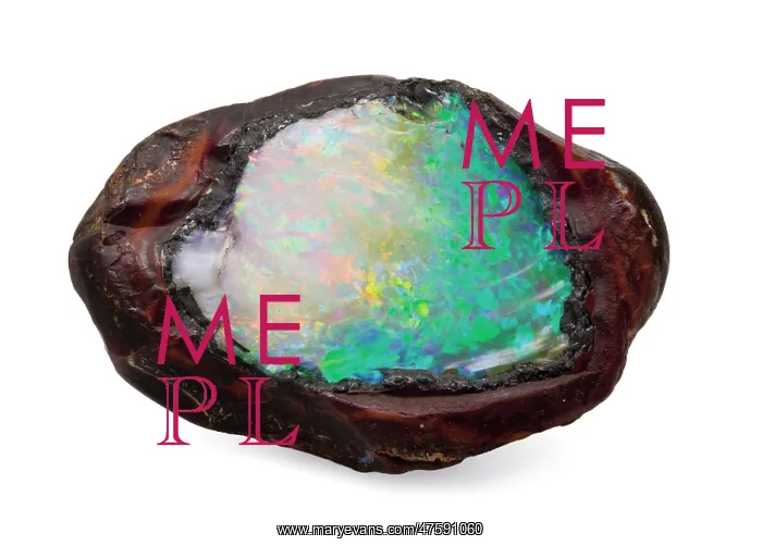 : Opal in its natural form. The boulder has been split open to reveal the : Opal in its natural form. The boulder has been split open to reveal the