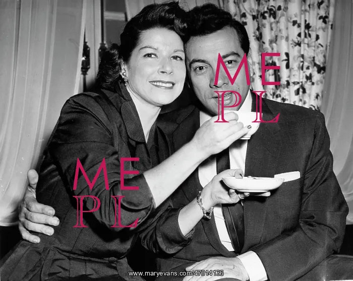 : Opera singer Mario Lanza drinking tea with his wife : Opera singer Mario Lanza drinking tea with his wife