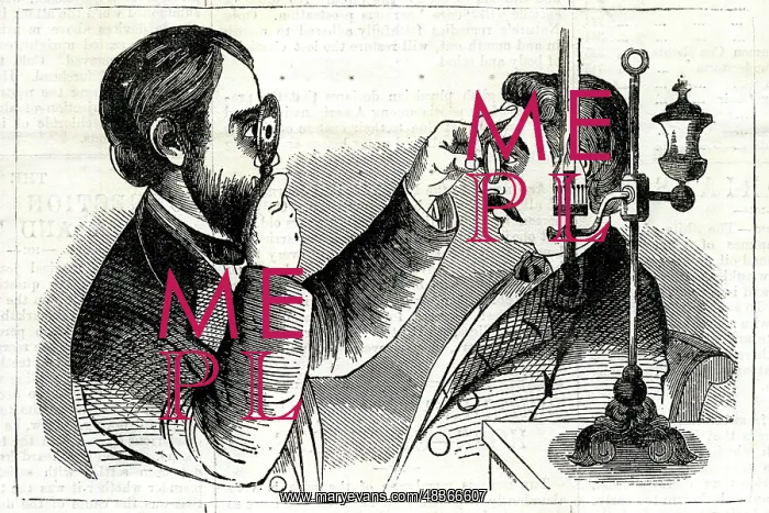 : Optician examining a patient's eyes : Optician examining a patient's eyes