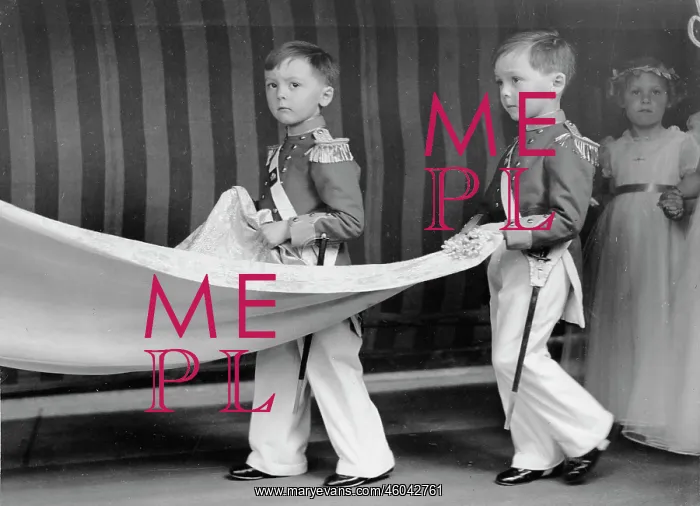 : Page boys. The twin brothers John and James Ormord carry the train of the bride : Page boys. The twin brothers John and James Ormord carry the train of the bride