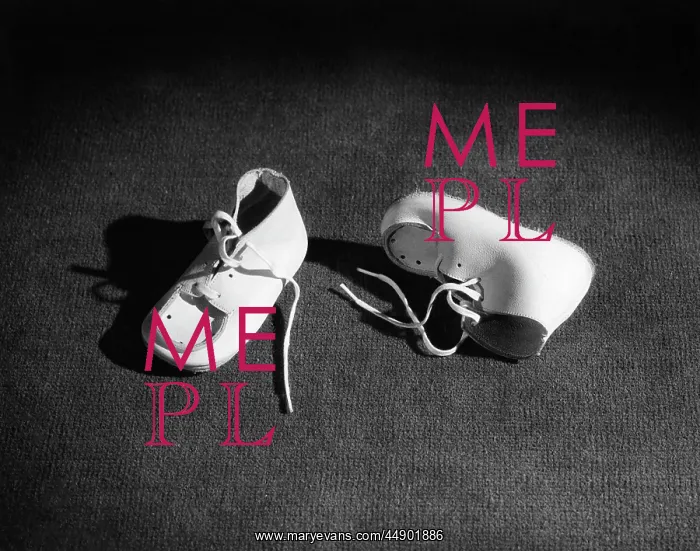 : Pair of Baby Booties in Spotlight One Upright and One On Sid : Pair of Baby Booties in Spotlight One Upright and One On Sid