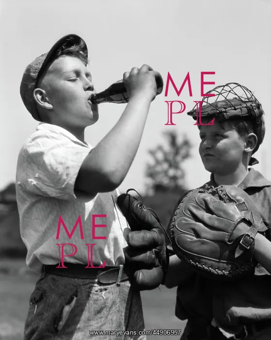 : Pair of boys wearing baseball gloves one with : Pair of boys wearing baseball gloves one with