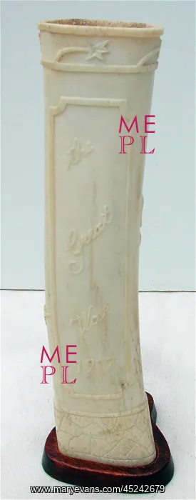 : Pair of carved bone ornaments with raised foliate decoration : Pair of carved bone ornaments with raised foliate decoration