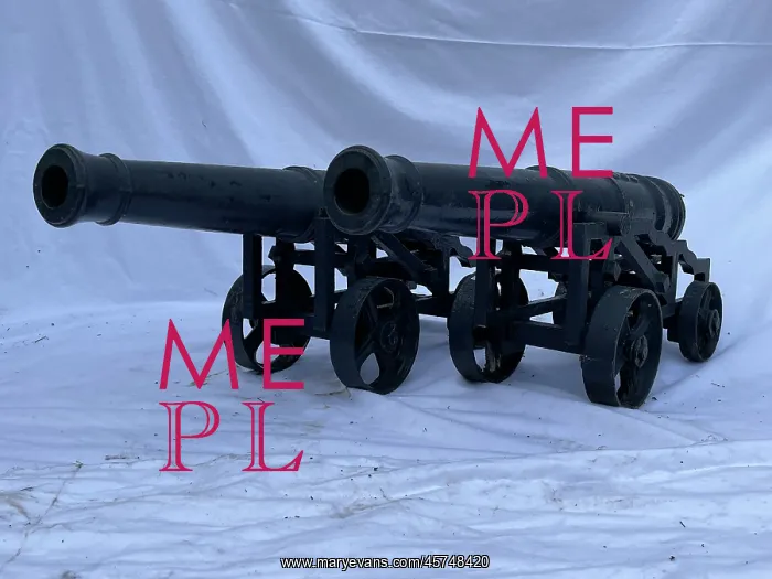: Pair of cast iron cannon on carriages : Pair of cast iron cannon on carriages