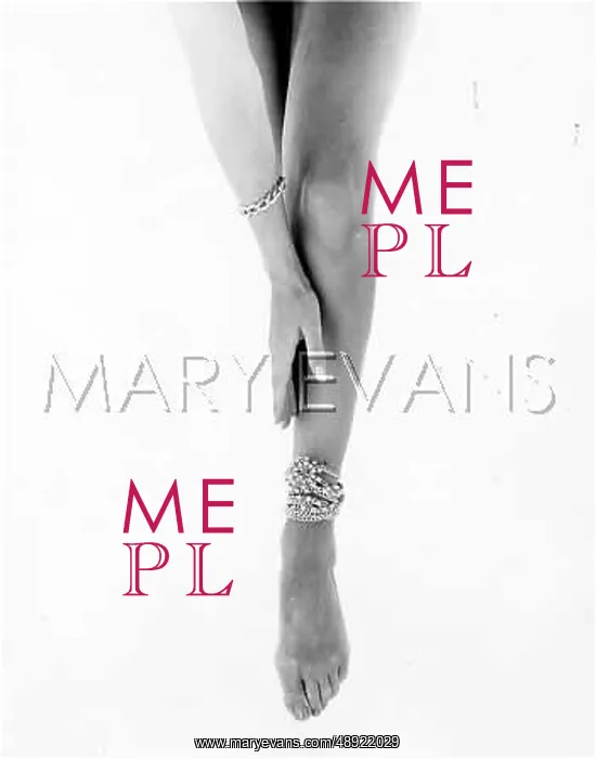  : LEGS. A pair of legs, with an anklet on one of them