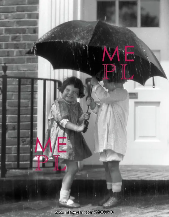 : Pair of little girls standing on front stoop : Pair of little girls standing on front stoop