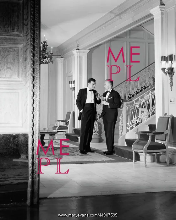 : Pair of Men in Tuxedos Holding Drinks & Talking Shown T : Pair of Men in Tuxedos Holding Drinks & Talking Shown T