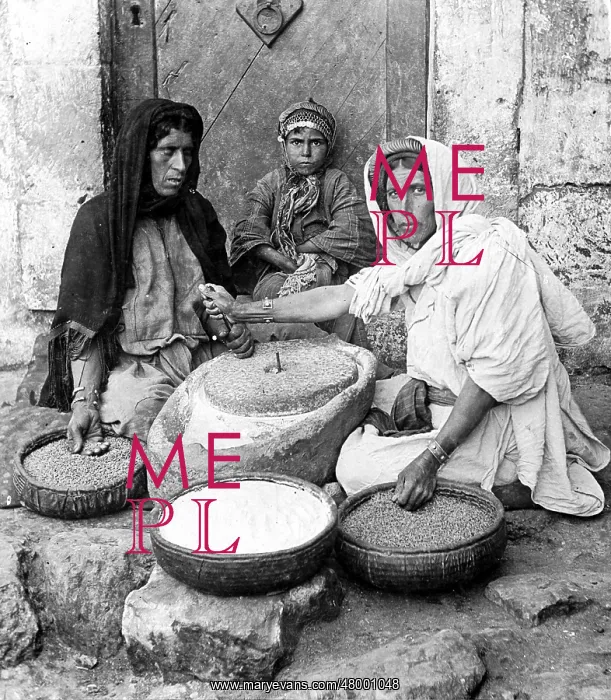 : Palestinian women grinding grain, 1905 : Palestinian women grinding grain, 1905