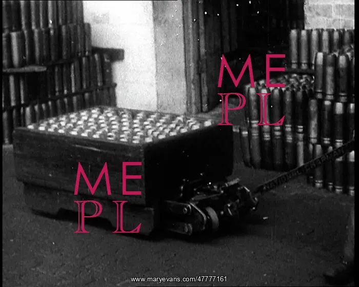 : A Pallet Of Artillery Shells Being Pulled Along : A Pallet Of Artillery Shells Being Pulled Along