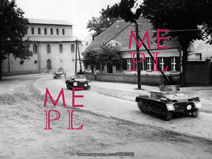 : Panzer I pass through a town in the 30s : Panzer I pass through a town in the 30s