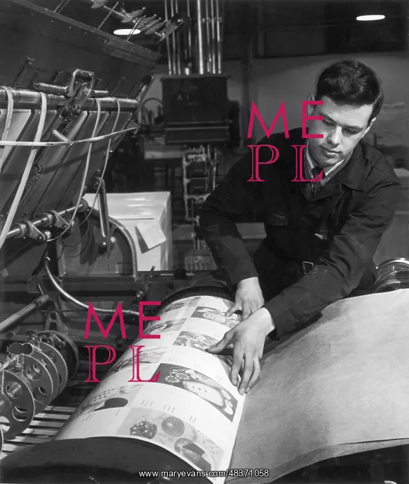 : Paper is placed in the printing press : Paper is placed in the printing press