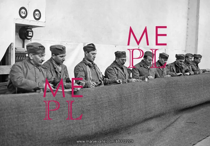 : Paperhanger at work, 1937 : Paperhanger at work, 1937