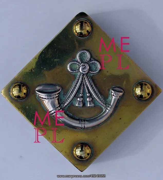 : Paperweight with a silver badge : Paperweight with a silver badge