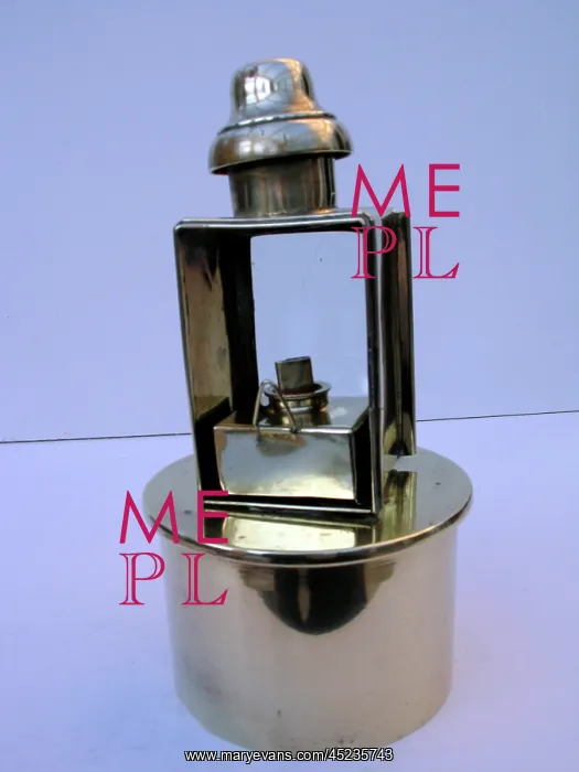 : Paraffin lamp mounted on a 4 5 Howitzer shell case : Paraffin lamp mounted on a 4 5 Howitzer shell case