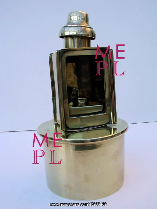 : Paraffin lamp mounted on a 4 5 Howitzer shell case : Paraffin lamp mounted on a 4 5 Howitzer shell case