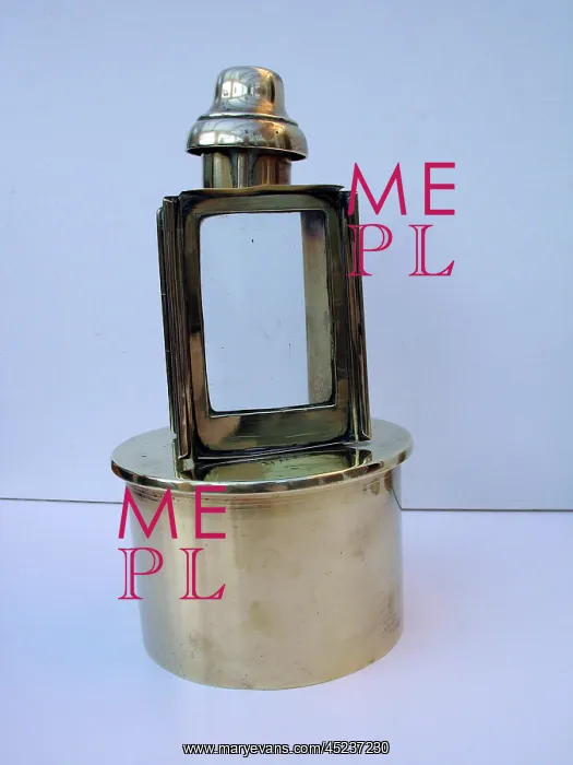 : Paraffin lamp mounted on a 4 5 Howitzer shell case : Paraffin lamp mounted on a 4 5 Howitzer shell case