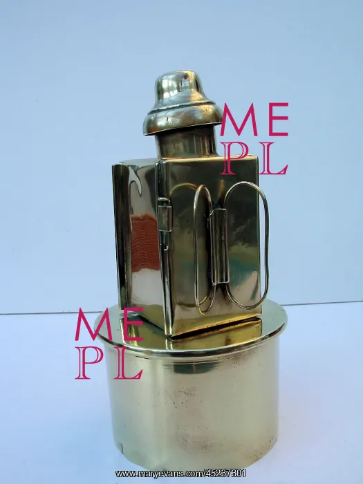 : Paraffin lamp mounted on a 4 5 Howitzer shell case : Paraffin lamp mounted on a 4 5 Howitzer shell case