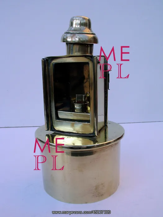 : Paraffin lamp mounted on a 4 5 Howitzer shell case : Paraffin lamp mounted on a 4 5 Howitzer shell case