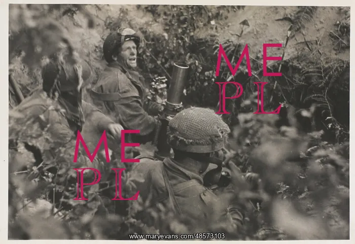 : Paratroops in action with 3 in mortars firing on enemy posit : Paratroops in action with 3 in mortars firing on enemy posit