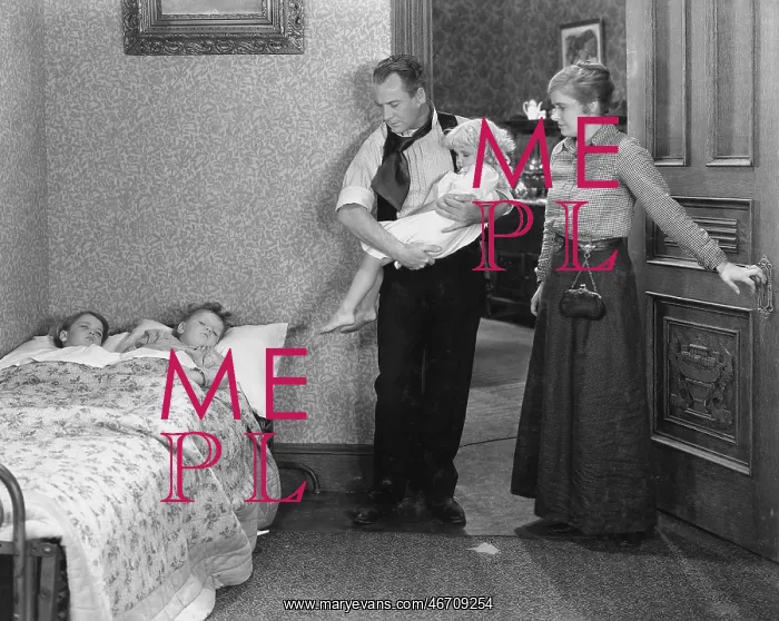 : Parents with children at bedtime : Parents with children at bedtime