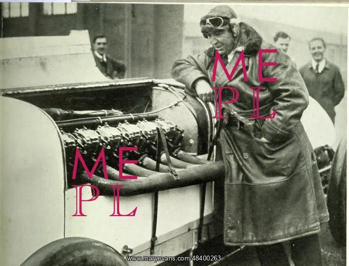 : Parry Thomas, racing driver, inspecting 400 hp engine : Parry Thomas, racing driver, inspecting 400 hp engine