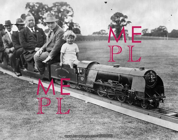 : Passangers on board of a miniature railway : Passangers on board of a miniature railway