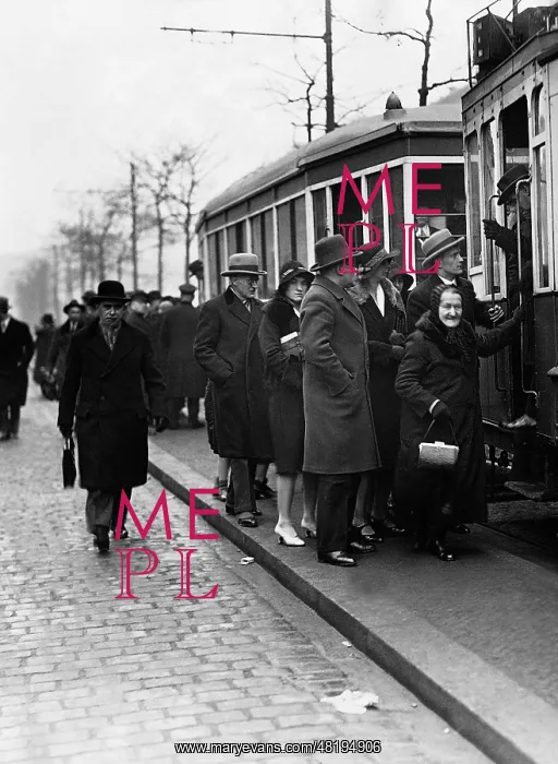 : Passengers board a streetcar, 1930 : Passengers board a streetcar, 1930