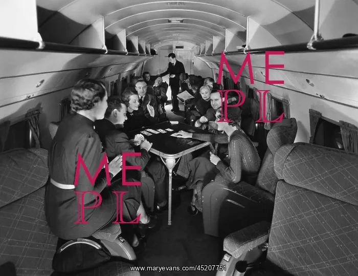 : Passengers play cards on United Airline's ? : Passengers play cards on United Airline's ?