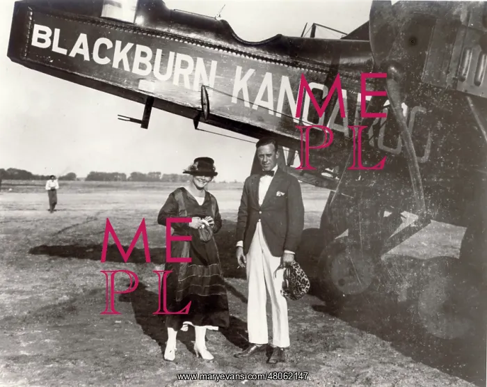 : Two passengers pose alongside a Blackburn RT1 Kangaroo : Two passengers pose alongside a Blackburn RT1 Kangaroo