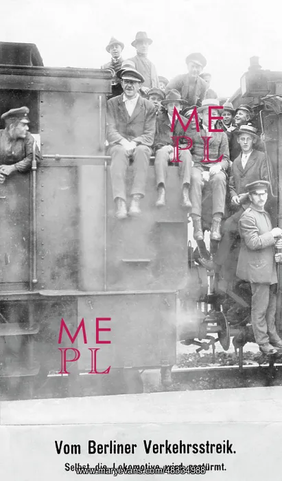 : Passengers sit on the locomotive of a train in Berlin, 1919 : Passengers sit on the locomotive of a train in Berlin, 1919