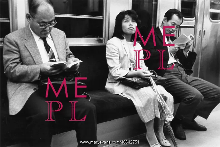 : Three passengers on the Tokyo underground : Three passengers on the Tokyo underground